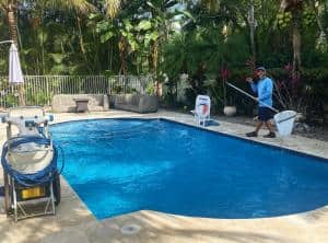 Photo Of Elements Pools Service Technician Performing Weekly Pool Maintenance Palm Beach, Florida