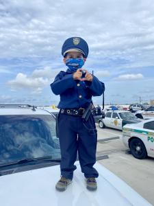 Stage IV Neuroblastoma Cancer warrior Kayson at the Mystic Force Foundation Parade in September 2020