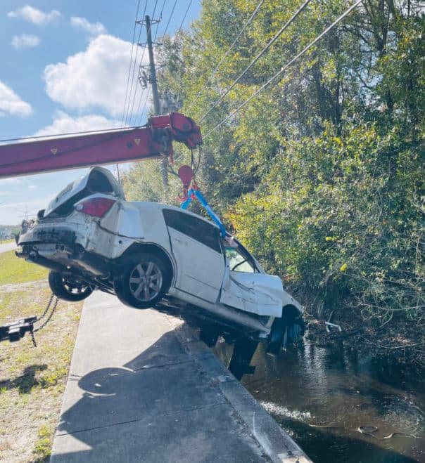 Troopers say the woman was traveling southbound on East Lake Road, south of Trinity Boulevard when she somehow lost control of the vehicle. 