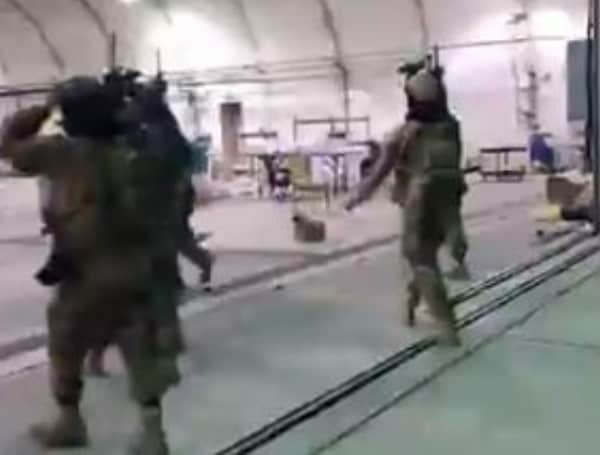 Video Shows Taliban Fighters In Stolen Military Gear Strolling Into Airport Hangar Once Controlled By US