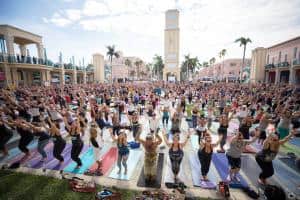 Something BIG YOGA, South Florida’s Largest FREE Outdoor Yoga Class, celebrates its 7th Year in Boca's Mizner Park.