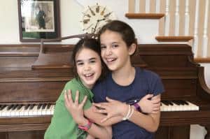 Seven and Nine Year Old Sisters Raise Funds for The Symphonia