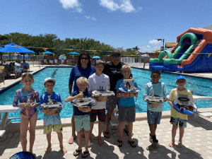 Mitchel Zelman Presents Awards to the Winners of the Lighthouse Point Yacht Club Kids Fishoff